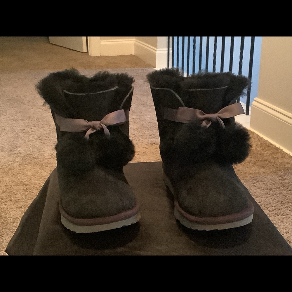 Girls. UGG boots. Black. Size 2.